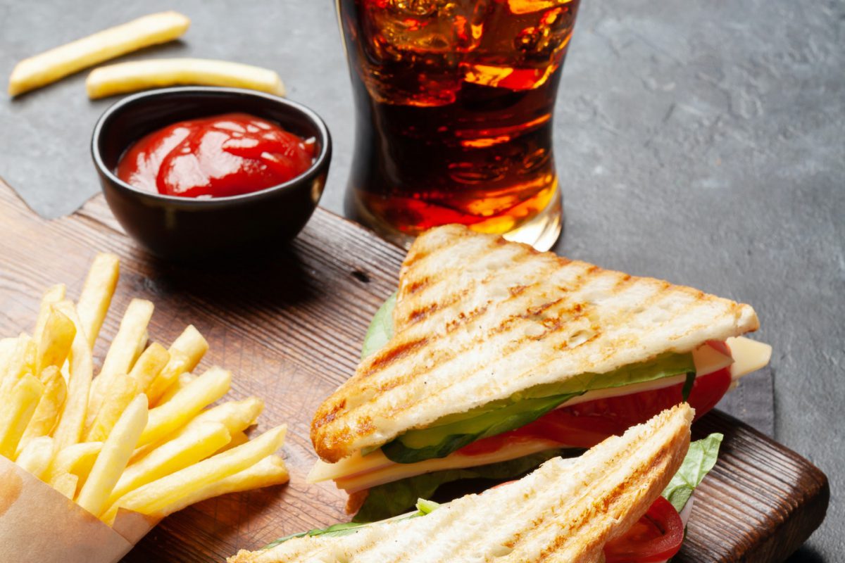 Club sandwich, potato fries chips and cola